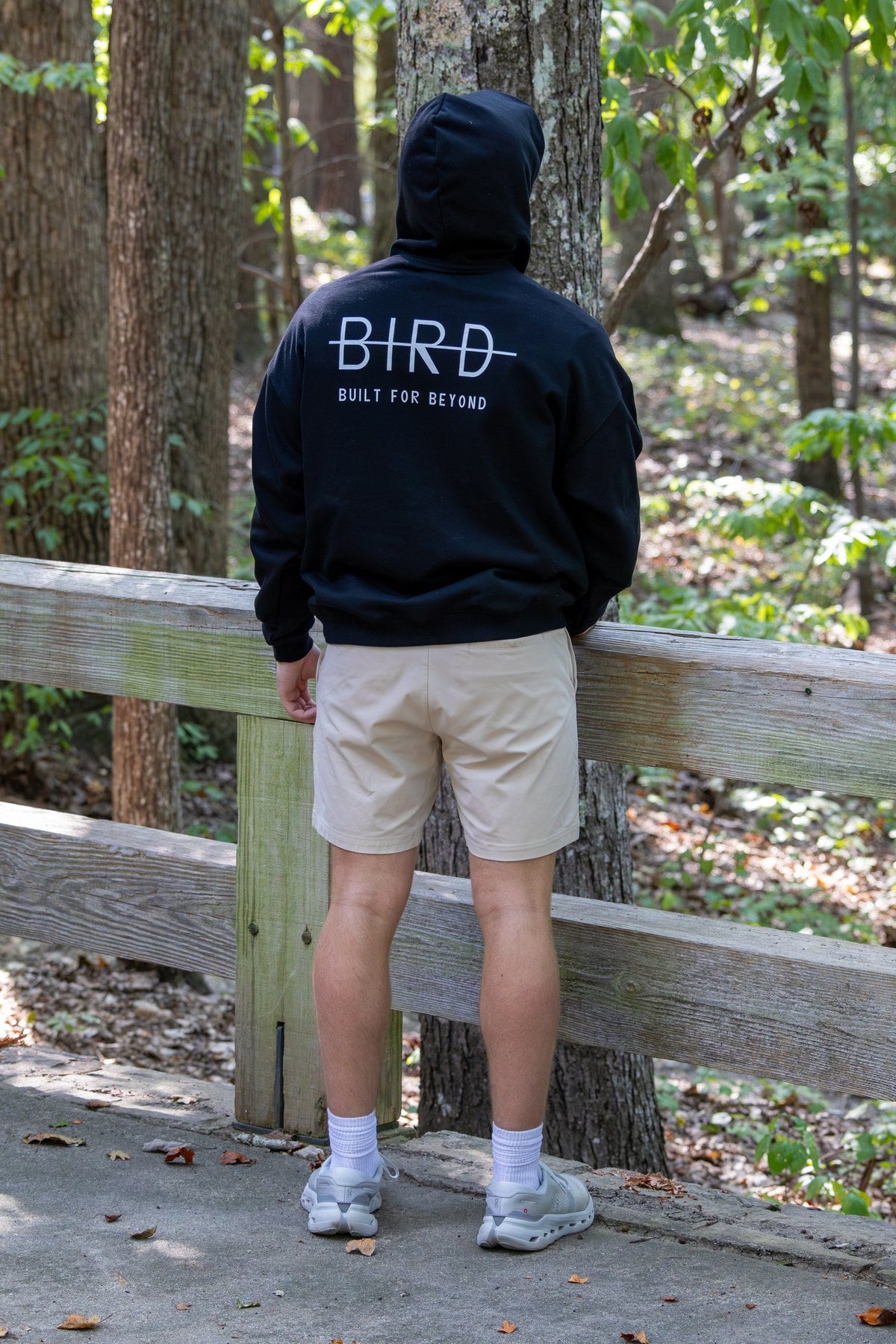 Back of the BIRD Campsite Heavyweight Hoodie showing the large BIRD back print, hood up